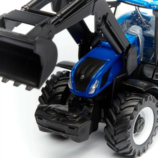 Дитяча іграшка Трактор "New Holland T7.315" Bburago 18-31632 з фронтальним навантажувачем